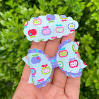 Adorable scalloped snap clips in cute prints perfect for back to school!