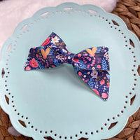 Beautiful deep blue and pink floral bows!