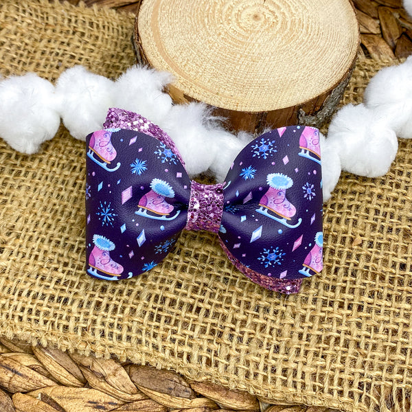 Beautiful ice skating print bows, perfect for winter!