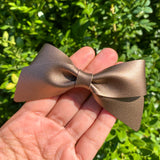 Beautiful smooth bronze faux leather bows