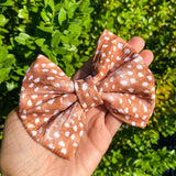 Gorgeous fawn print fabric bow clips or headbands.