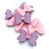 Adorable pastel pigtail bows with heart embellishments!