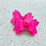 Adorable pigtail bows with happy daisy embellishments!