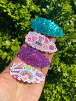 Fun bright leopard print or glitter scalloped snap clips!