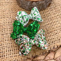 Super sparkly 2" glitter pigtail bows perfect for St Patrick's Day!