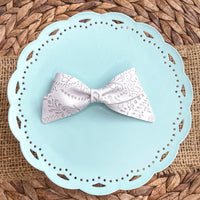 Embossed lace Lucy bows in beautiful neutral colours