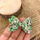 Super sparkly 2" glitter pigtail bows perfect for St Patrick's Day!