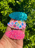 Fun bright leopard print or glitter scalloped snap clips!