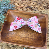 Beautiful pink and red Christmas floral bows!