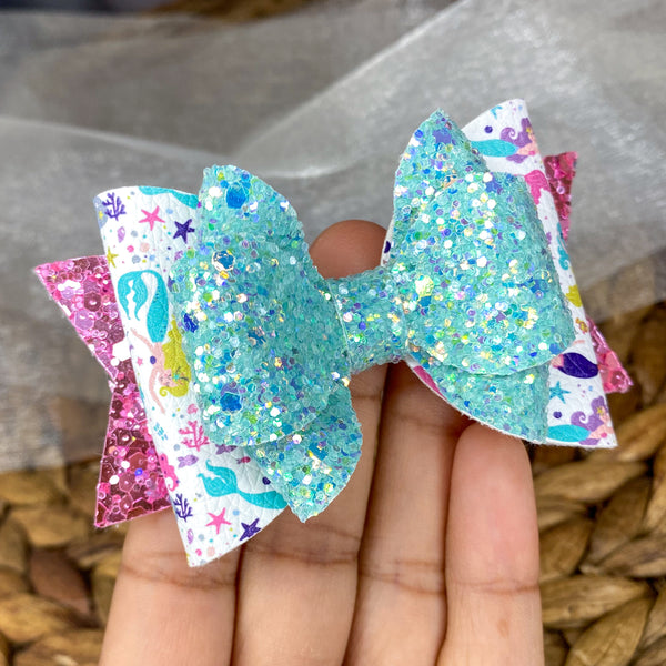 Super sparkly glitter and mermaid print bow!