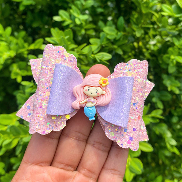 Beautiful pink sparkly mermaid bows!