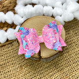Beautiful tropical print and sparkly glitter bows!
