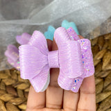 Gorgeous and glittery stacked pinwheel bows!