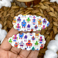 Scalloped snap clips in awesome space, dino and robot prints!