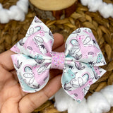 Adorable pastel "dino" print bows!