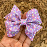 Adorable tiny purple unicorn bows!