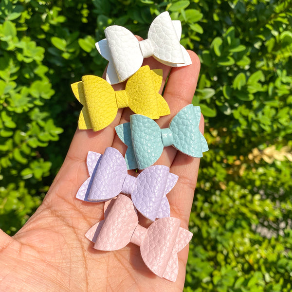 Adorable tiny pigtail bows in perfect soft pastels!!