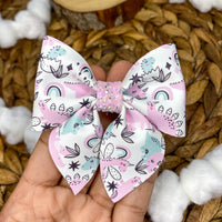 Adorable pastel "dino" print bows!