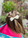 Bright and happy banana print and super sparkly glitter bows