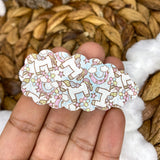 Adorable scalloped snap clips in cute fairy and unicorn prints!