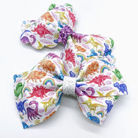 Adorable rainbow dinosaur bows!