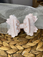 Gorgeous blush Daisy bow with tulle and tiny floral appliques!