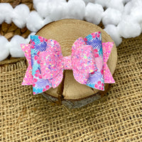 Beautiful tropical print and sparkly glitter bows!