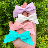 Beautiful faux leather Lucy bows in pretty pastel colours!