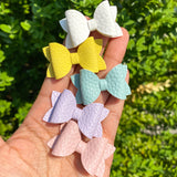 Adorable tiny pigtail bows in perfect soft pastels!!