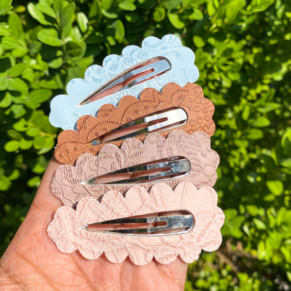 Beautiful embossed lace faux leather scalloped peek a boo snap clips!