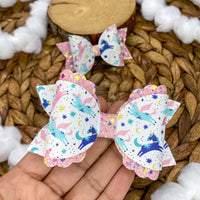 Beautiful pastel flying unicorn bows!