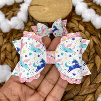 Beautiful pastel flying unicorn bows!