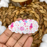 Adorable scalloped snap clips in cute pink prints!