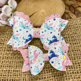 Beautiful pastel flying unicorn bows!