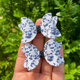 Adorable monochromatic 2" pigtail bows in adorable prints and patterns!