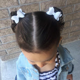 Adorable linen like faux leather pigtail bows in perfect neutral shades.