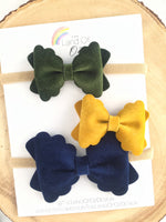 Adorable velvet scalloped pinch bows in gorgeous colours!