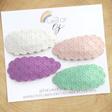 Textured faux leather scalloped snap clips in lots of pretty colours!