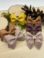 Embossed lace faux leather scalloped pinch bows in gorgeous neutral colours