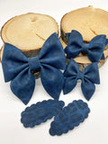 Gorgeous pink, brown, grey, black or navy faux suede leopard print bows!
