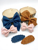Pink, navy or brown leopard print, faux suede snap clips!