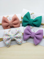 Adorable sprinkle or solid colour bullet fabric bow clips or headbands Liverpool fabric birthday sprinkle cake smash bow