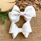 Sweet and subtle multicolour star bows