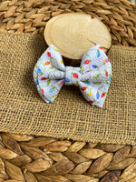 Adorable bullet fabric bows in perfect colours and patterns for the holidays!.
