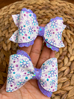 Beautiful teal and purple snowflake bows!