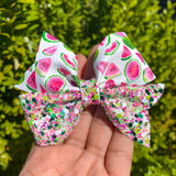 Adorable pink and green watermelon print and sparkly glitter bows