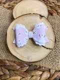 Adorable muted blush and white snowmen bows!