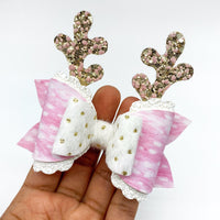 Adorable pink spotted fawn and sparkly glitter reindeer bows, perfect for Christmas!