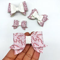 Adorable pink candy cane bows, perfect for the holidays!