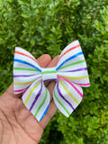 Multicoloured crayon stripe bows!